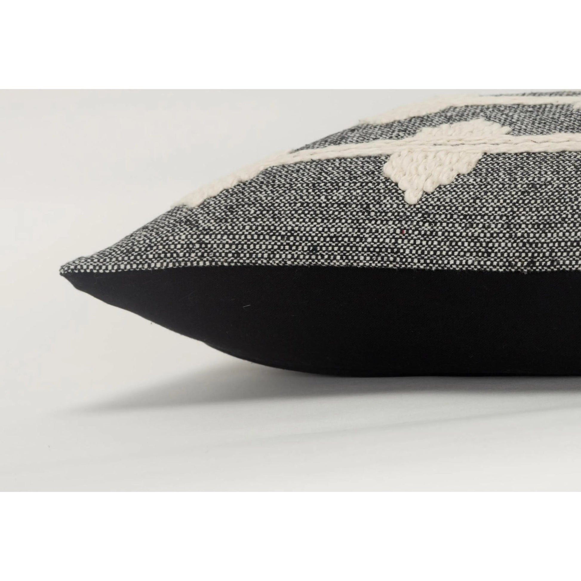 Christian Pillow by HedgeApple Essentials in black. Made from cotton in a rustic style.