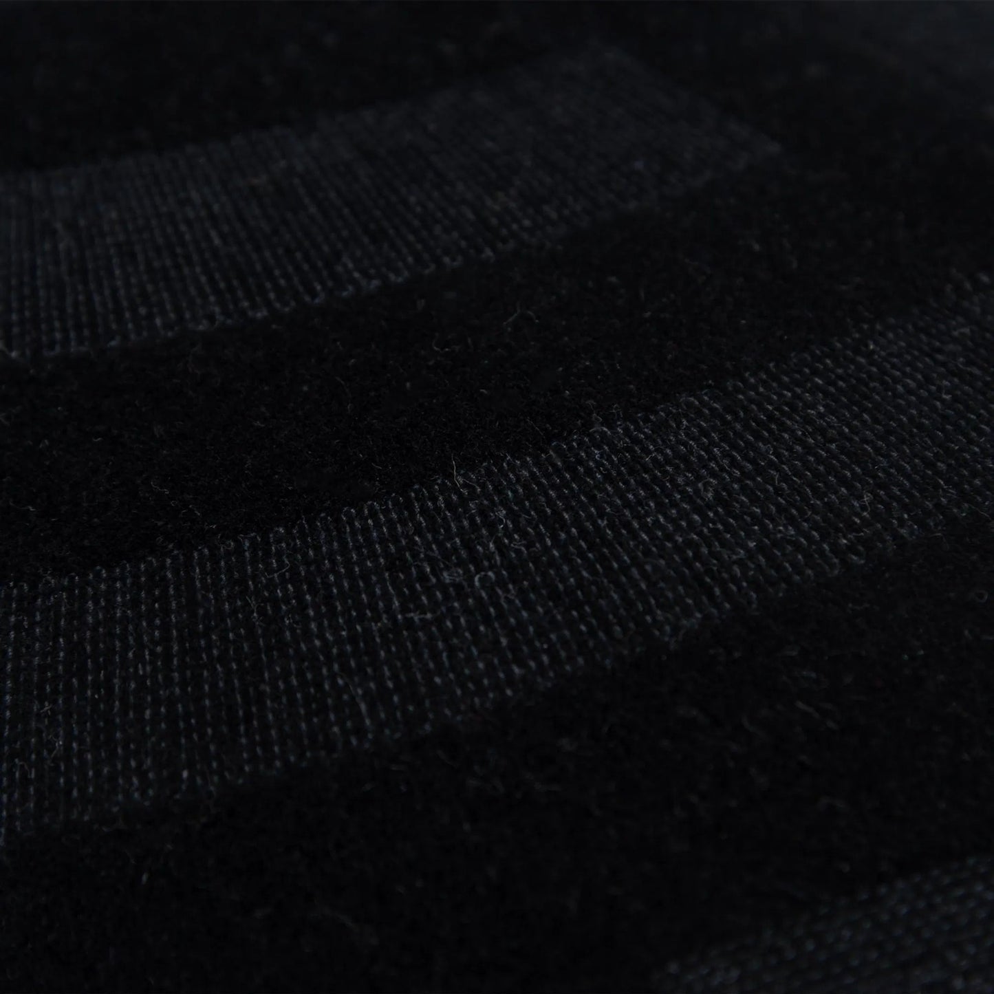 002 SI-2438435 | Closeup | Kingery Pillow by HedgeApple Essentials in black. Made from cotton, polyester in a modern style.