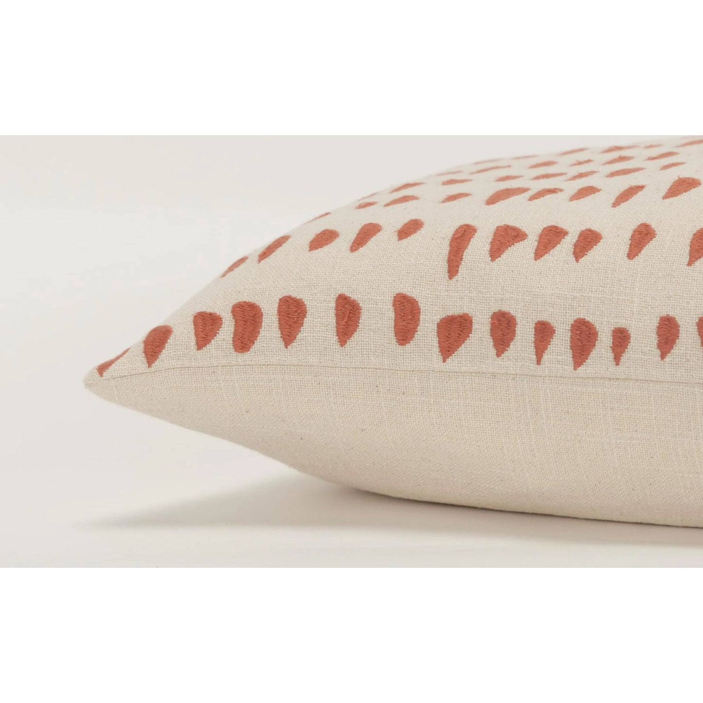 003 SI-2438554 | Closeup | Jarvis Pillow by HedgeApple Essentials in coral. Made from cotton in a eclectic & global style.