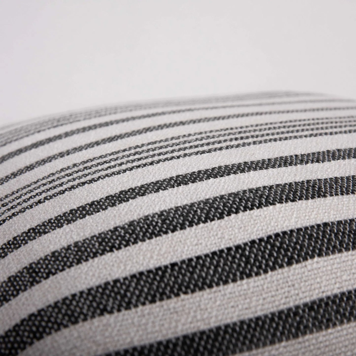 002 SI-2438594 | Closeup | Lamont Indoor/Outdoor Pillow by HedgeApple Essentials in dark grey, grey. Made from polyester pet in a eclectic & global style.
