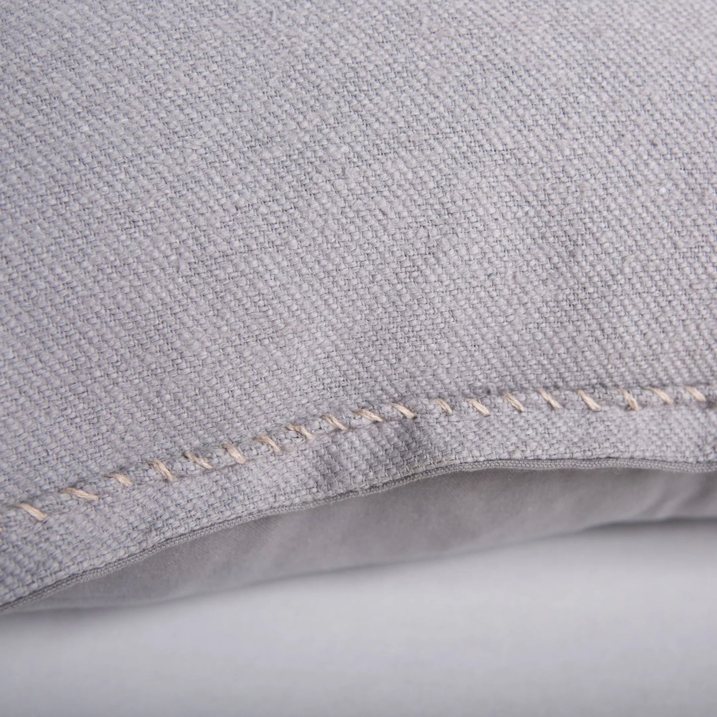 006 SI-2295753,SI-2295946 | Closeup | Walker Pillow by HedgeApple Essentials in grey. Made from cotton in a transitional style.