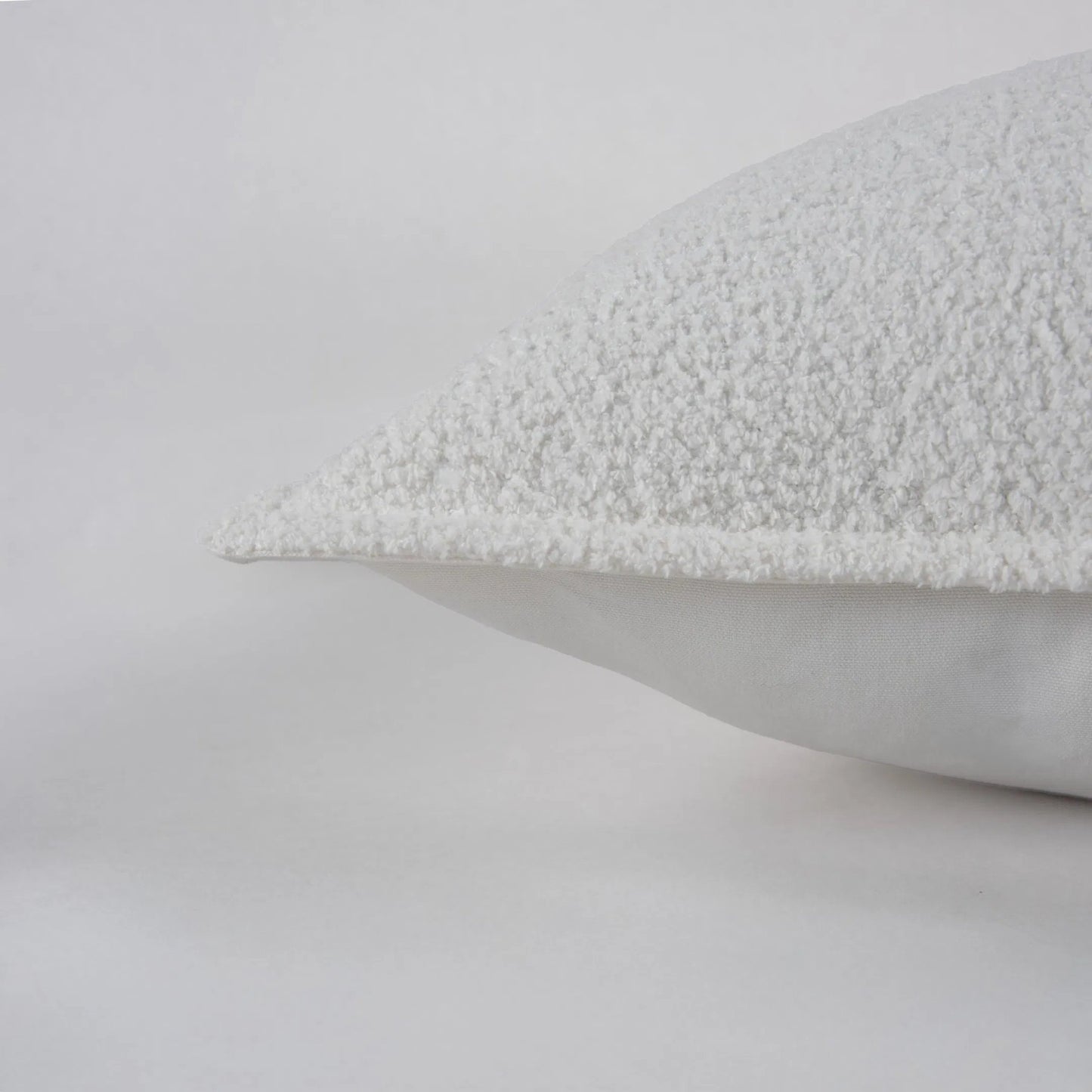 004 SI-2295953 | Closeup | Amador Pillow by HedgeApple Essentials in brown, ivory. Made from polyester, poly boucle, cotton boucle in a transitional style.