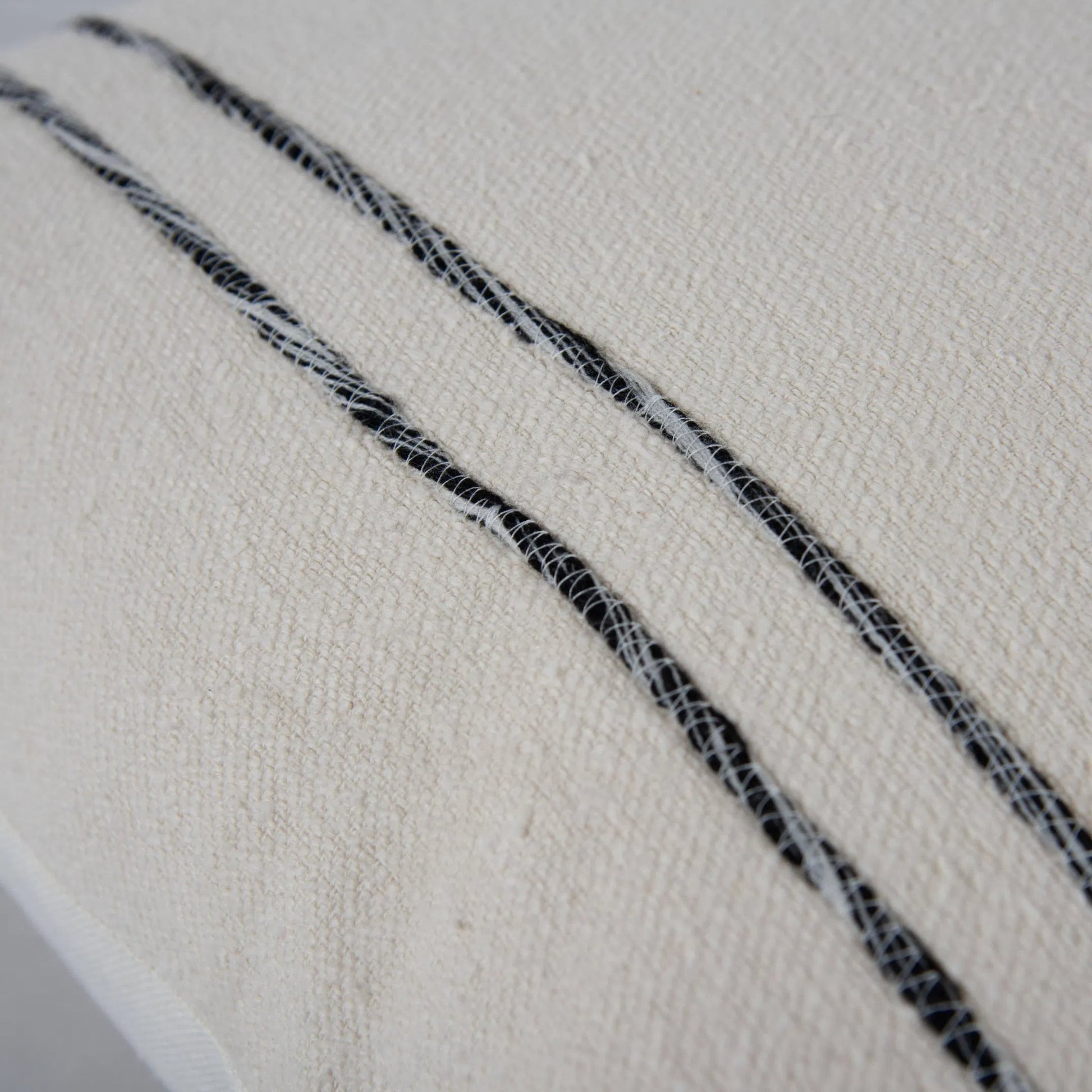 Borden Pillow by HedgeApple Essentials in black, ivory. Made from cotton boucle in a transitional style.