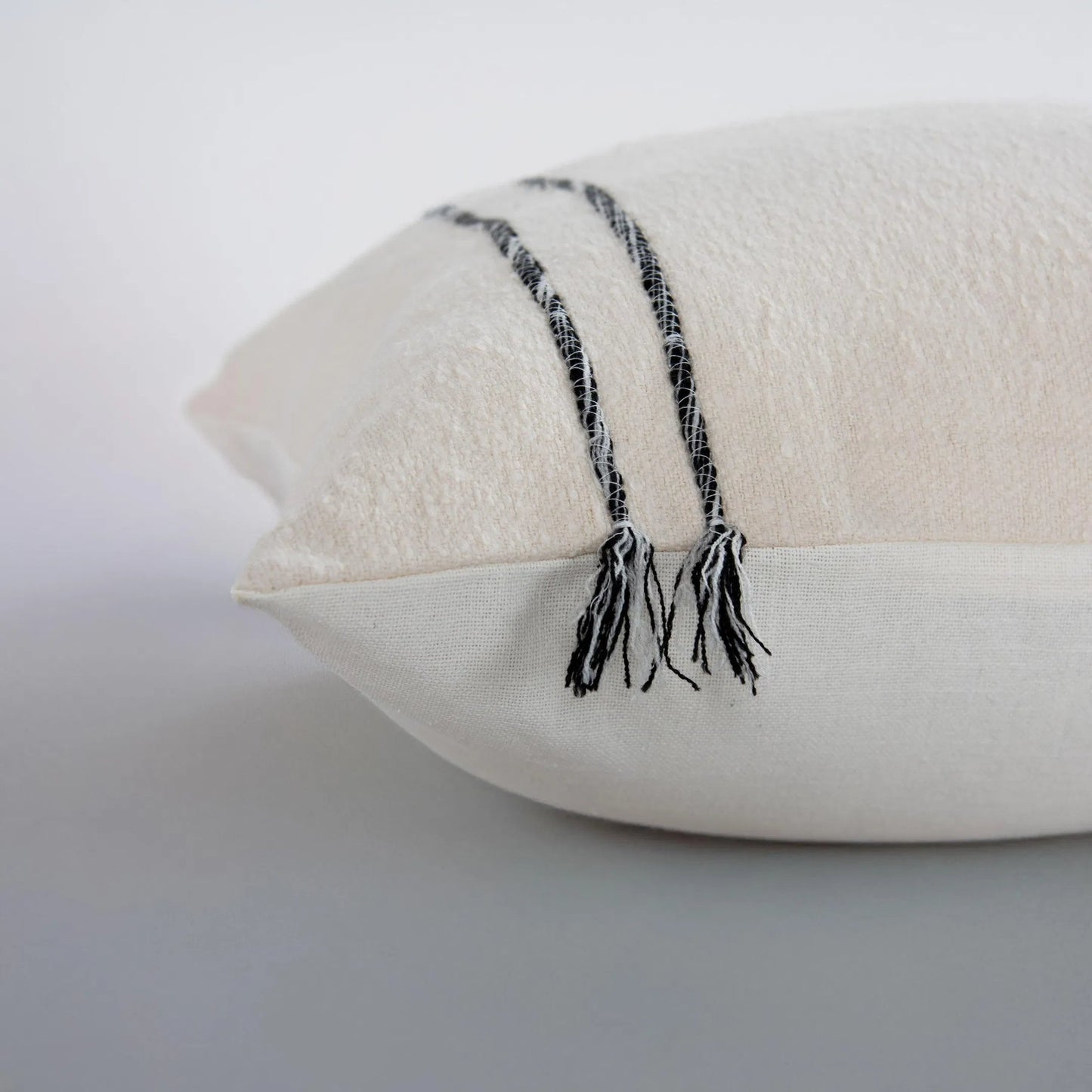 003 SI-2295963 | Closeup | Borden Pillow by HedgeApple Essentials in black, ivory. Made from cotton boucle in a transitional style.