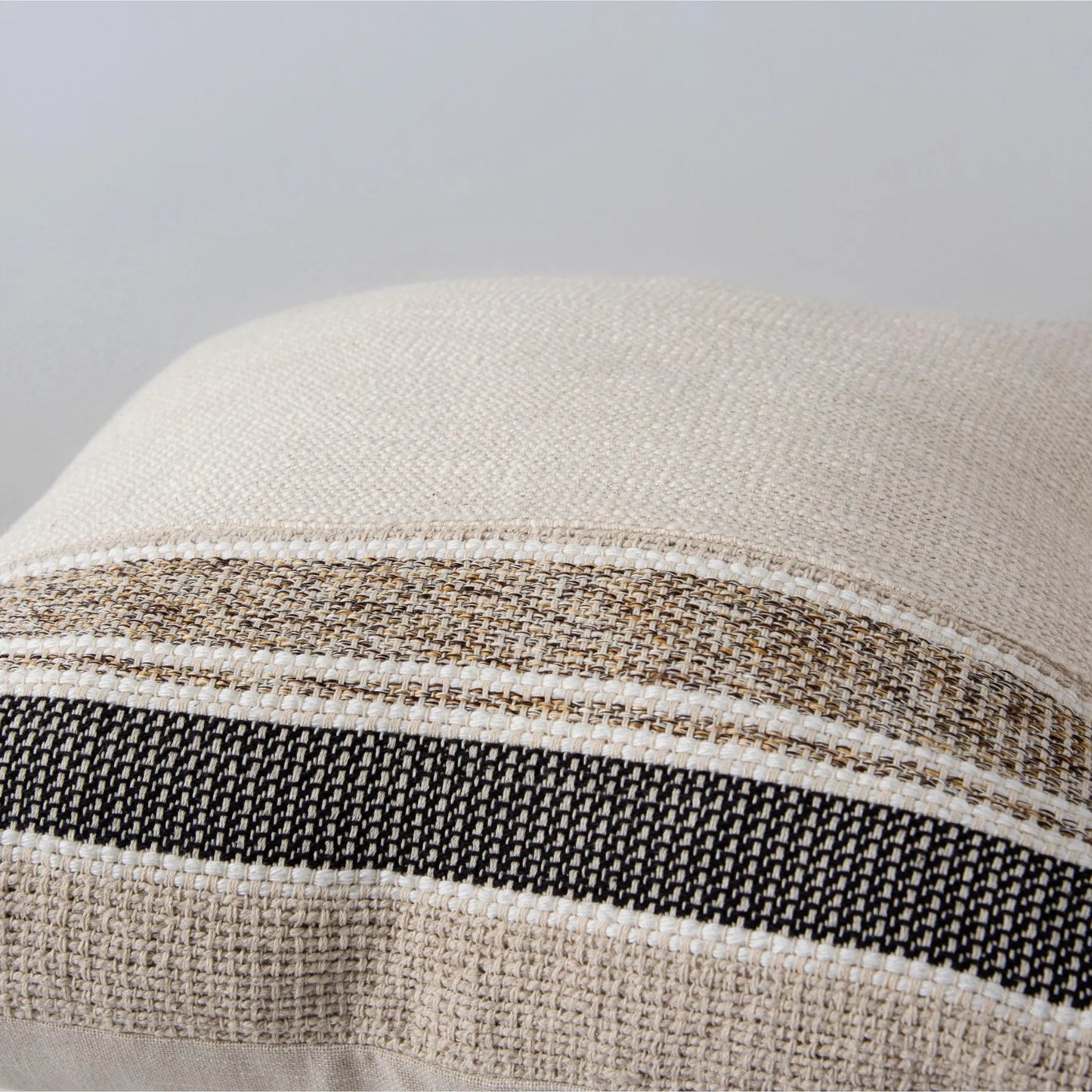 001 SI-2295966 | Closeup | Oconto Pillow by HedgeApple Essentials in natural, brown. Made from yarn dyed cotton woven in a transitional style.