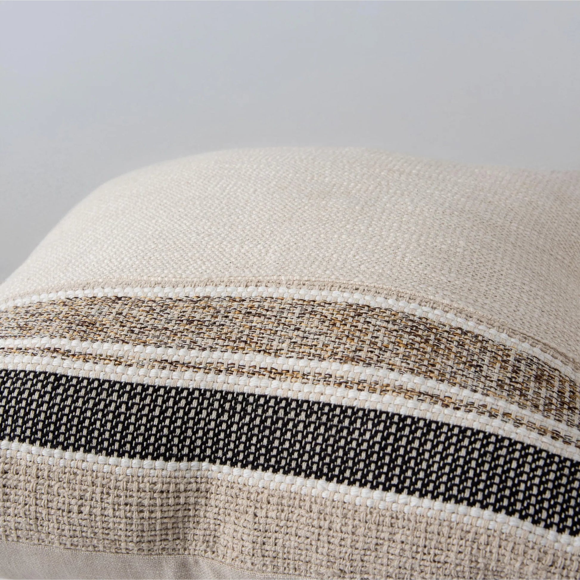 Oconto Pillow by HedgeApple Essentials in natural, brown. Made from yarn dyed cotton woven in a transitional style.