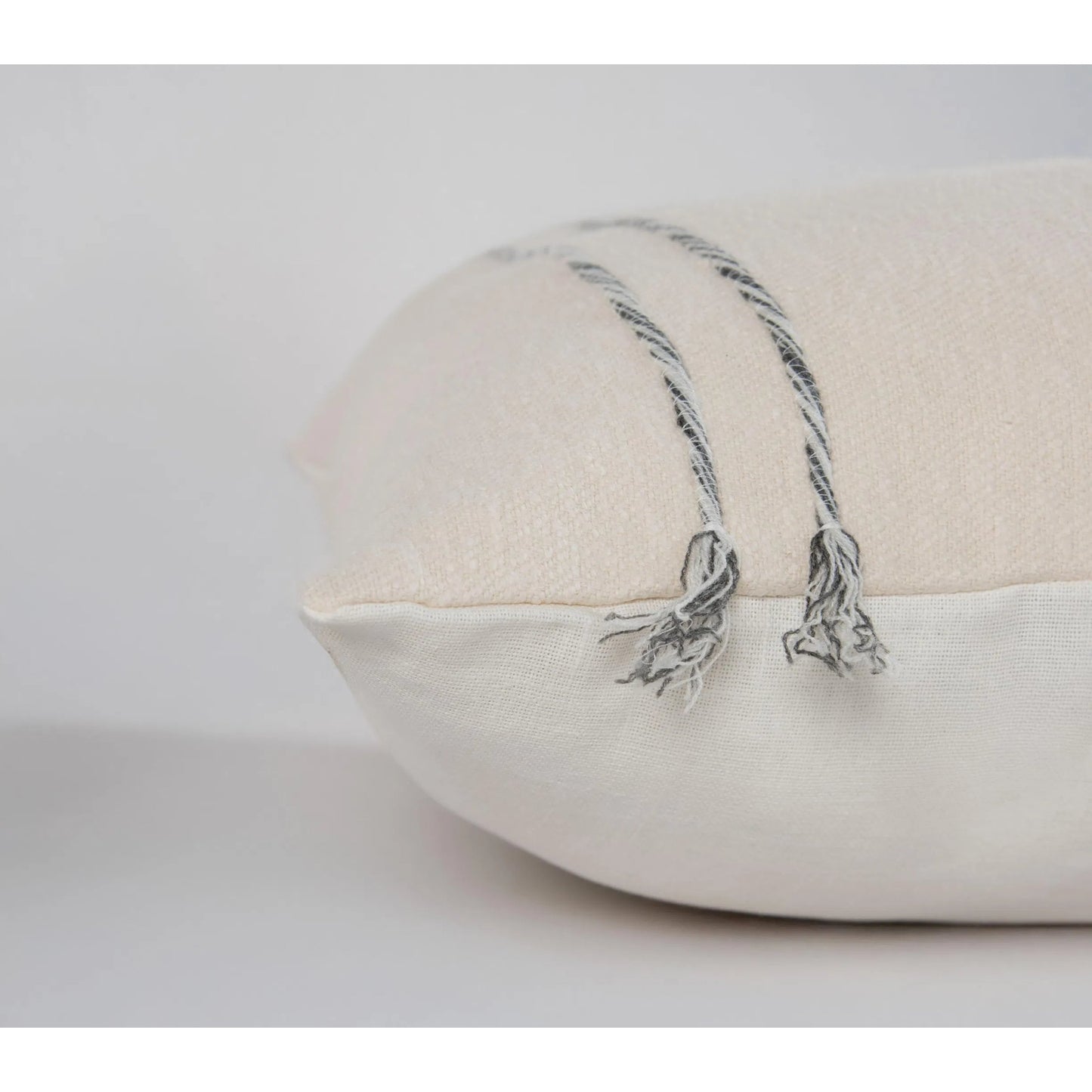 004 SI-2295978 | Closeup | Tama Pillow by HedgeApple Essentials in dark grey, ivory. Made from cotton boucle in a transitional style.