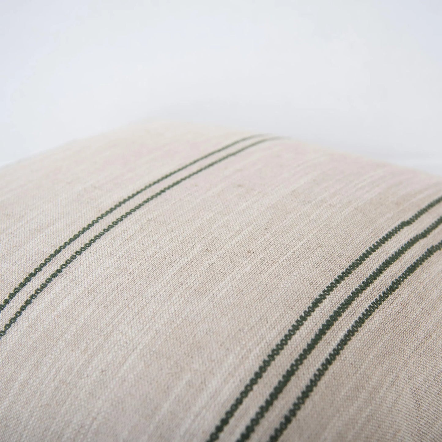 001 SI-2438634 | Closeup | Bucklin Pillow by HedgeApple Essentials in green. Made from cotton linen in a transitional style.