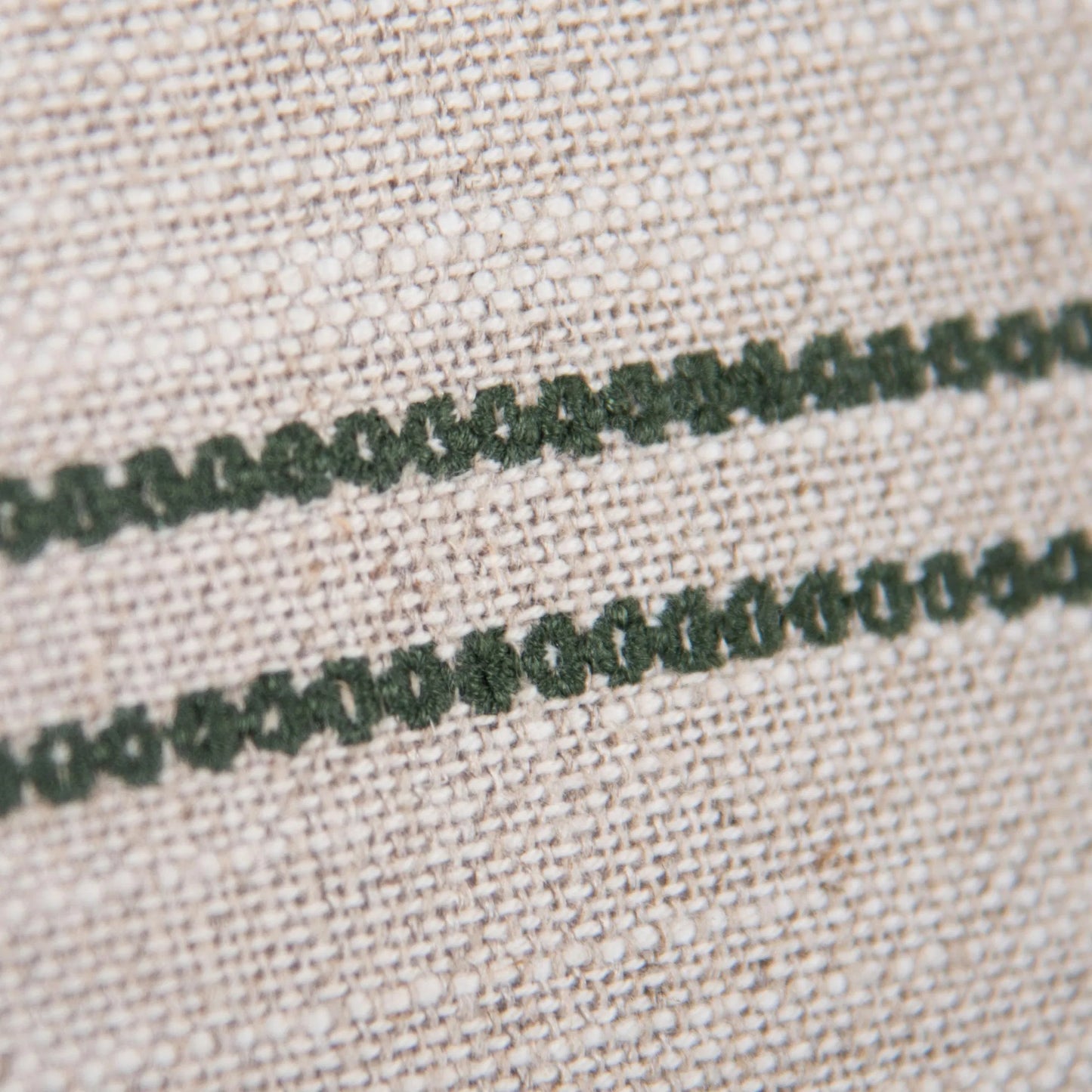 002 SI-2438634 | Closeup | Bucklin Pillow by HedgeApple Essentials in green. Made from cotton linen in a transitional style.