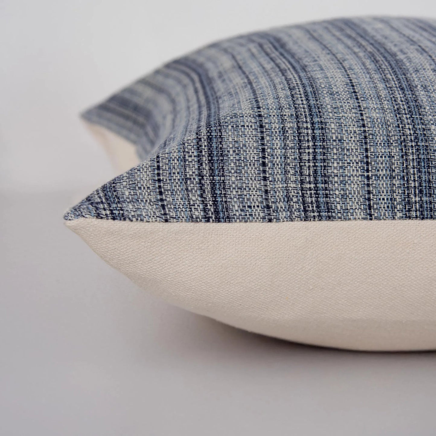 004 SI-2438639 | Closeup | Kittitas Pillow by HedgeApple Essentials in navy, blue. Made from yarn dyed cotton in a eclectic & global style.