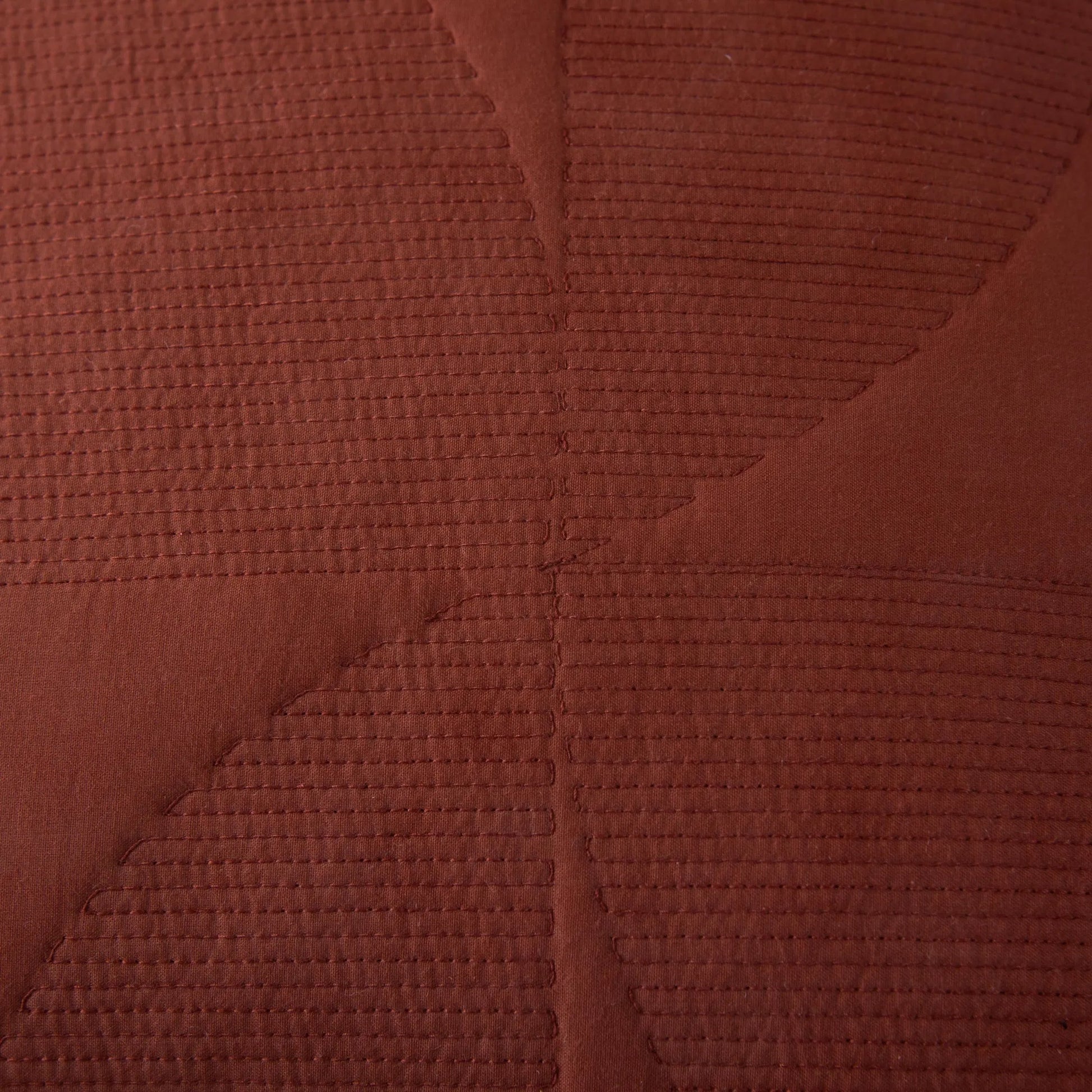 Sierra Pillow by HedgeApple Essentials in red, orange, rust, terra cotta. Made from polyester, cotton voile in a modern style.