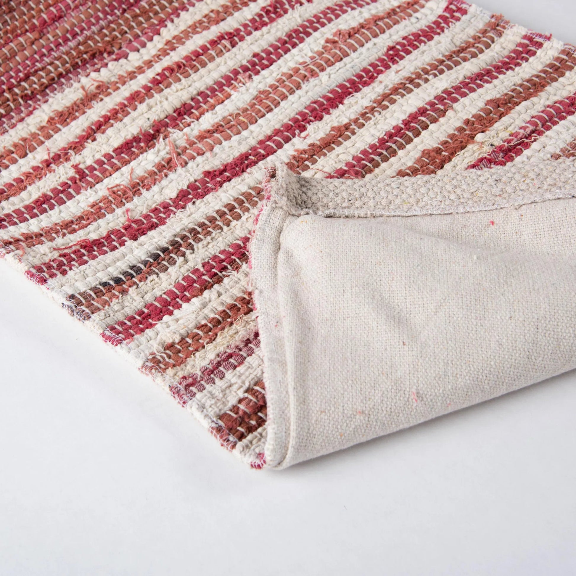 Apache Pillow by HedgeApple Essentials in red, berry. Made from recycled denim in a rustic style.