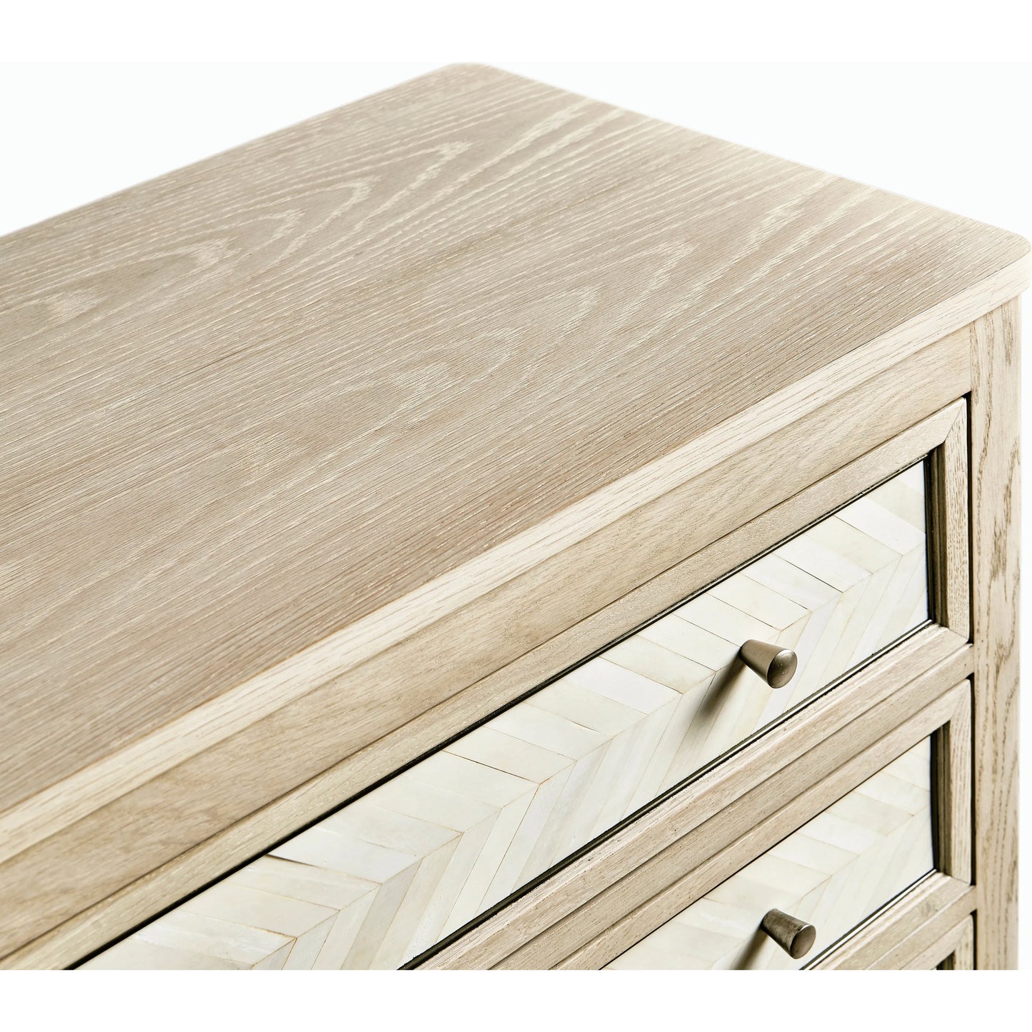 002 SI-2186253 | Closeup | Water Berm Bachelors Chest by Jonathan Charles in bleached oak. Made from oak, faux bone, brass in a transitional style.