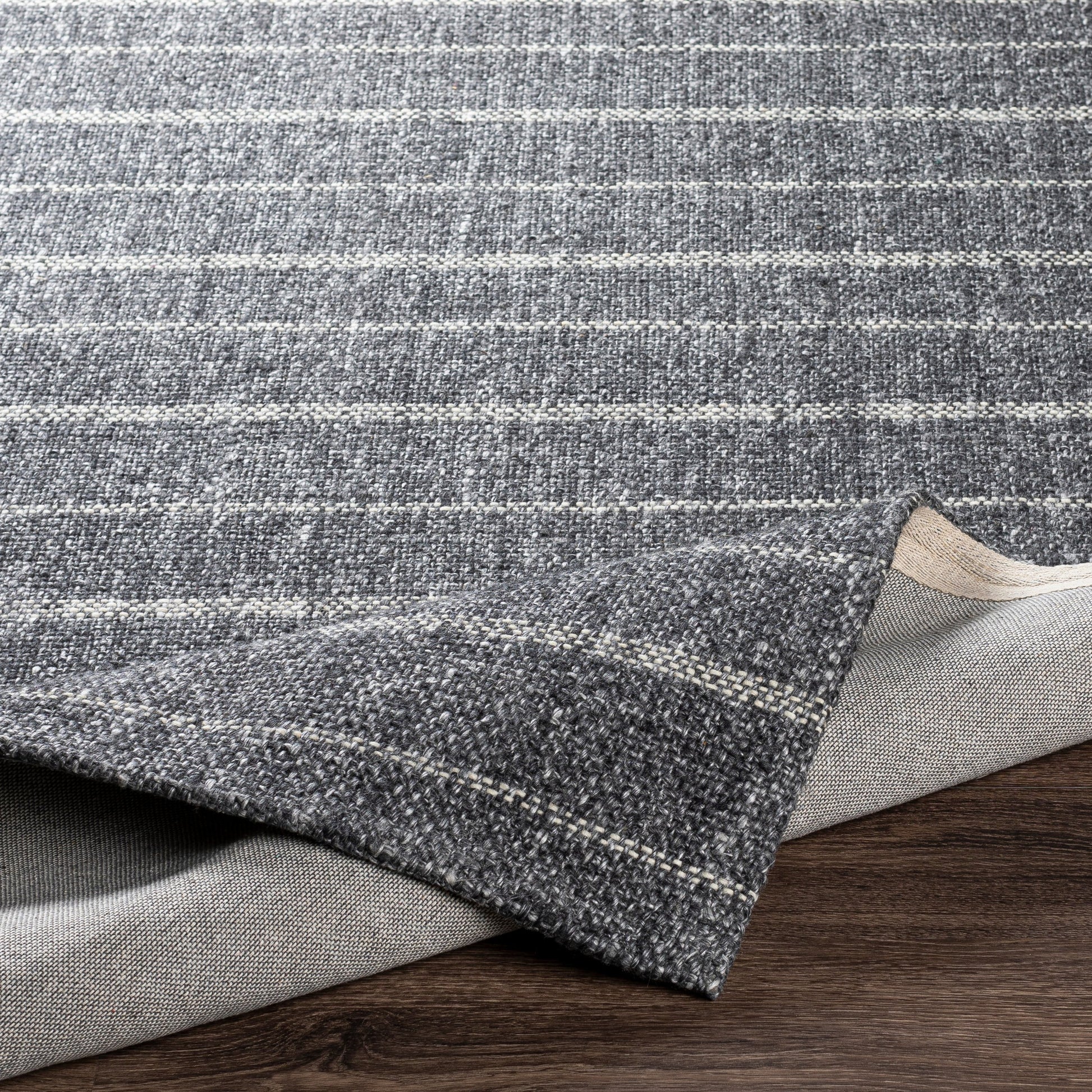 Tartan Rug - 27254 by Livabliss in black, light gray, gray. Made from 50% viscose, 50% wool in a unique style.