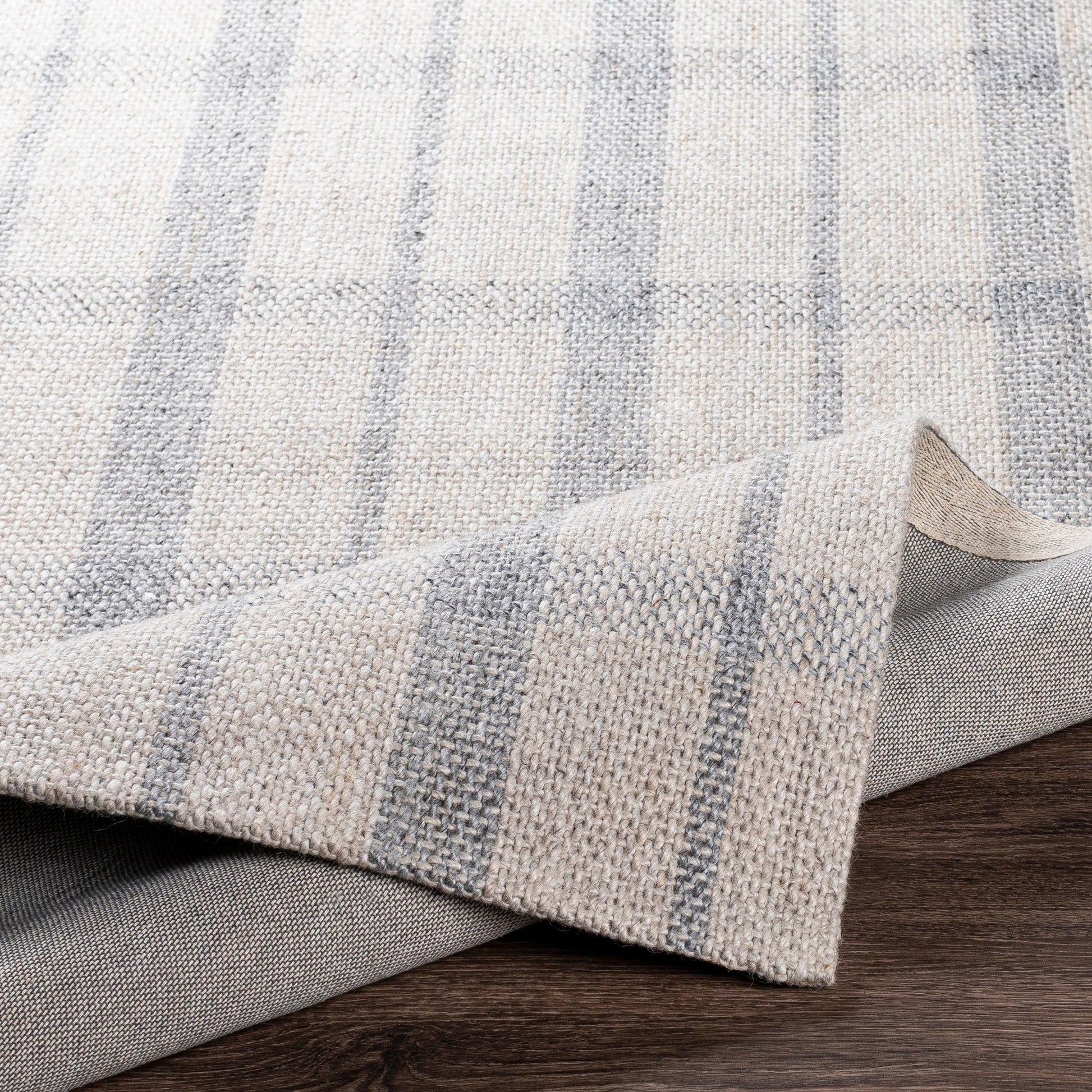 Tartan Rug - 27255 by Livabliss in oatmeal, light gray, gray. Made from 50% viscose, 50% wool in a unique style.