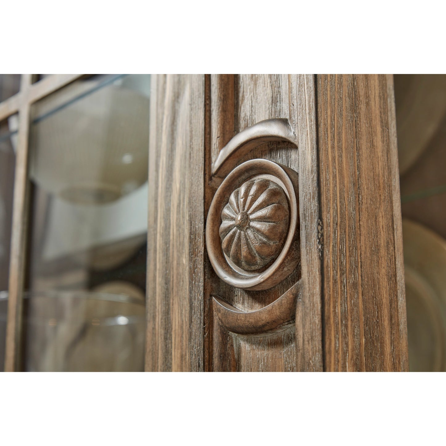 004 SI-2064896 | Closeup | Architrave China Cabinet by A.R.T. Furniture in almond. Made from pine solids and veneer, glass, metal in a traditional style.