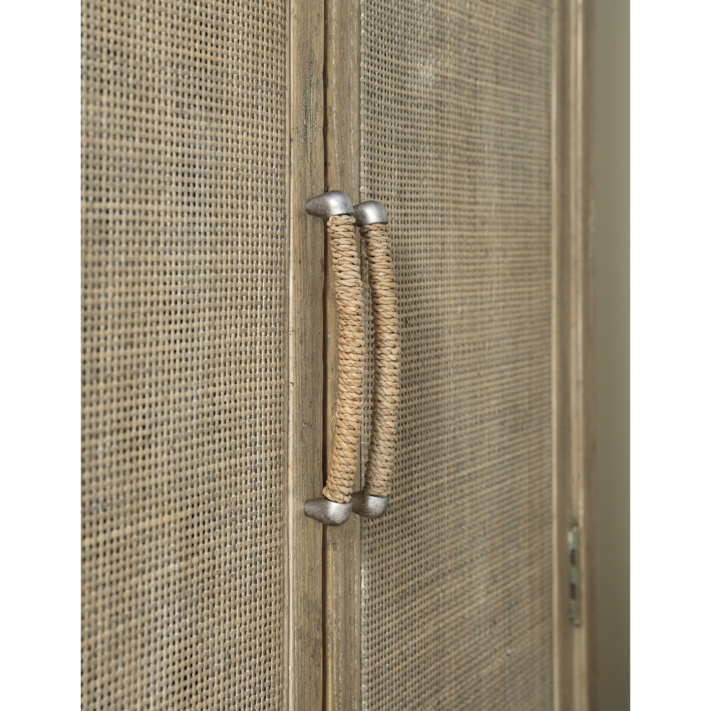 002 SI-1749869 | Closeup | Surfrider Wardrobe by Hooker Furniture in driftwood. Made from pecan veneers, rattan, self-closing undermount drawer guides in a coastal style.