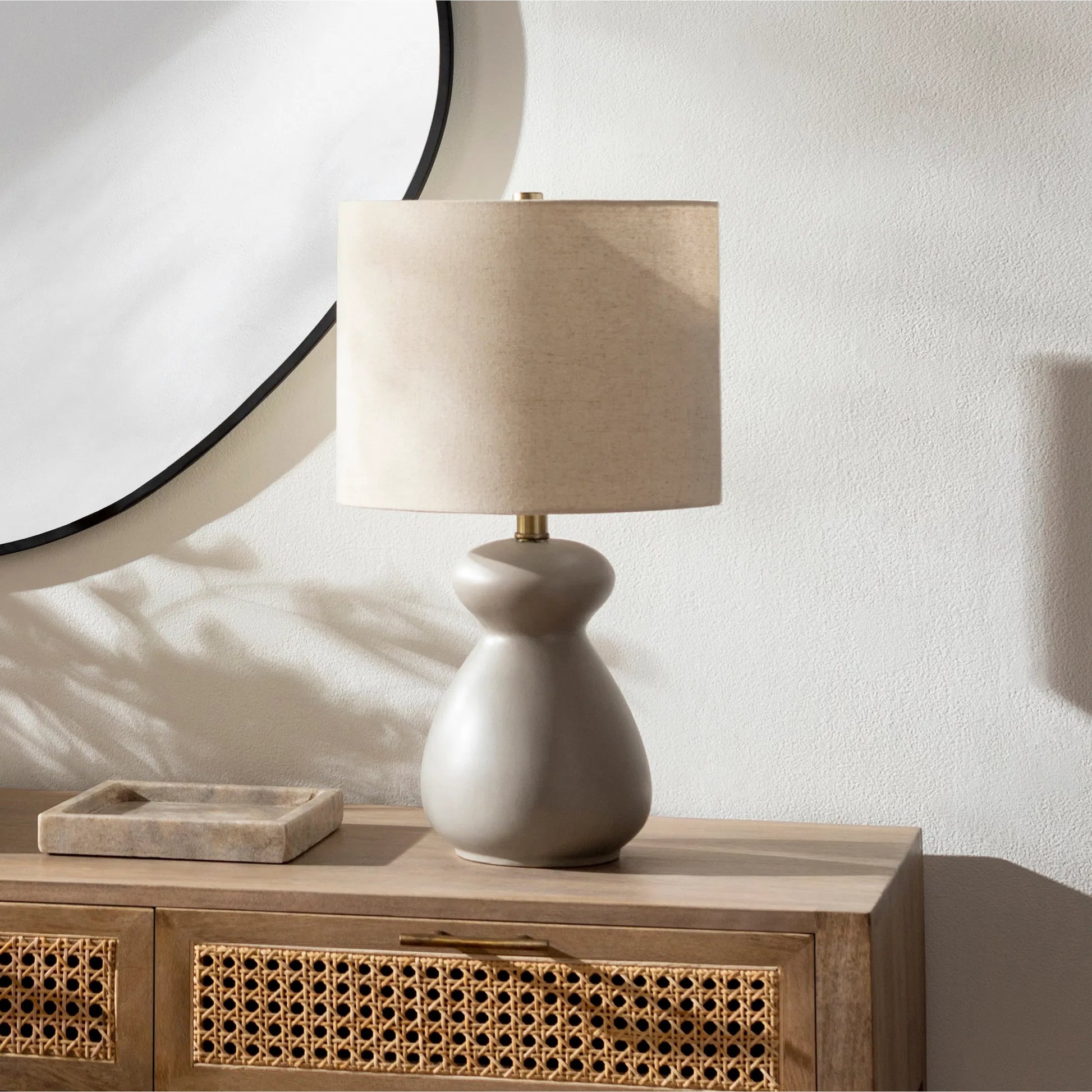 Tubular Table Lamp - 31889 by Livabliss in glazedpolished. Made from shade (outside): linen, shade (inside): polyester, body: ceramic, finial: metal, harp: metal in a modern style.