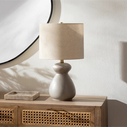 Tubular Table Lamp - 31889 by Livabliss in glazedpolished. Made from shade (outside): linen, shade (inside): polyester, body: ceramic, finial: metal, harp: metal in a modern style.