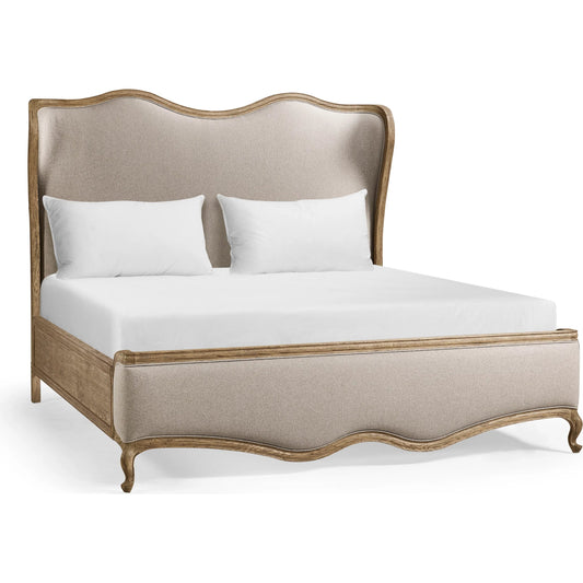 Echo Canyon Upholstered Bed by Jonathan Charles in faded oak. Made from oak in a traditional style.