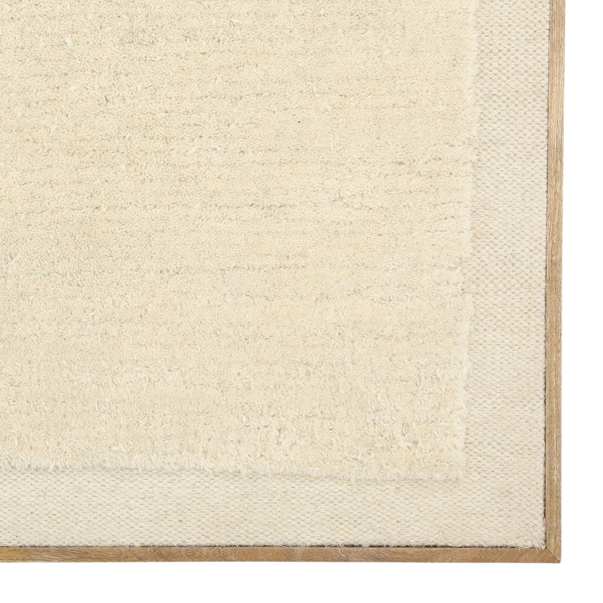 Tiffani by Arch & Plane in textured art in a natural wood float frame. Made from woven wool rug, wood frame in a transitional style.