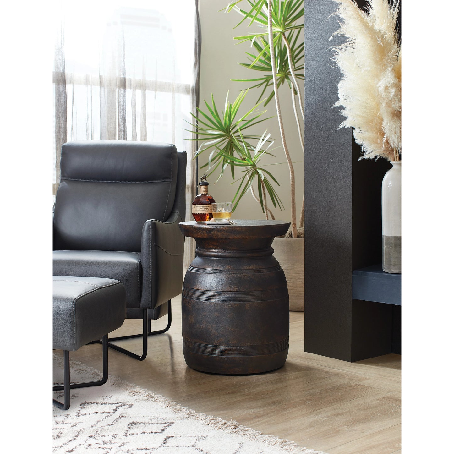 003 SI-1959540 | Lifestyle | Big Sky Urn Spot Table by Hooker Furniture in distressed black. Made from resin in a modern style.
