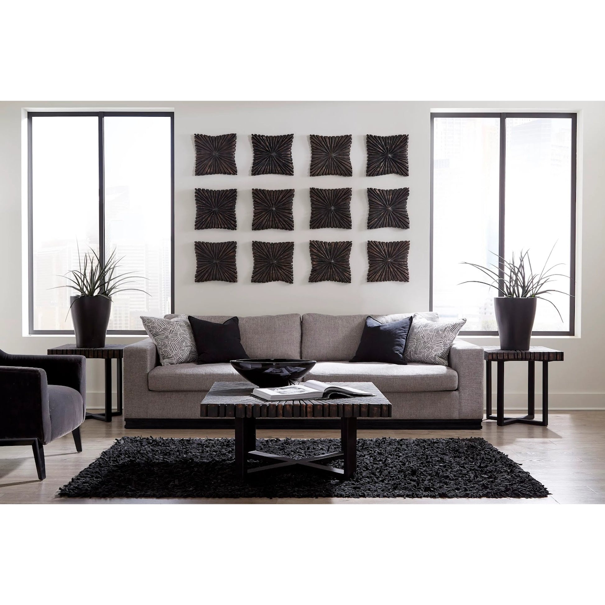 Chainsaw Square Coffee Table by Phillips Collection in black. Made from wood, chamcha wood, metal, iron in a modern style.