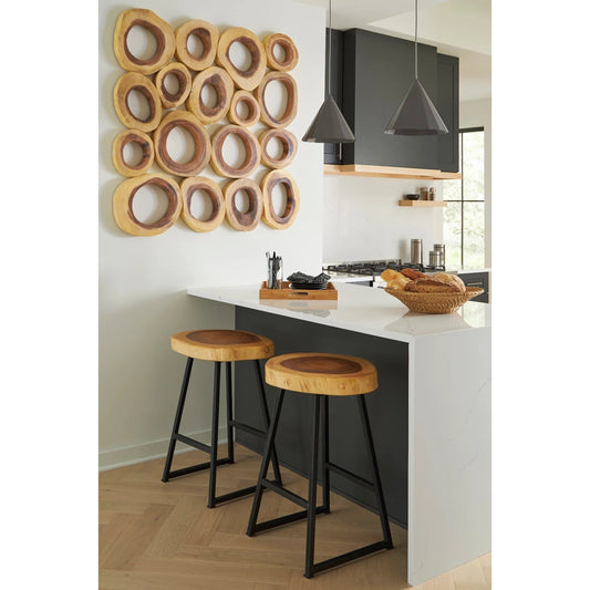 Chuleta Round Bar Stool by Phillips Collection in black, brown. Made from wood, chamcha wood, metal in a modern style.