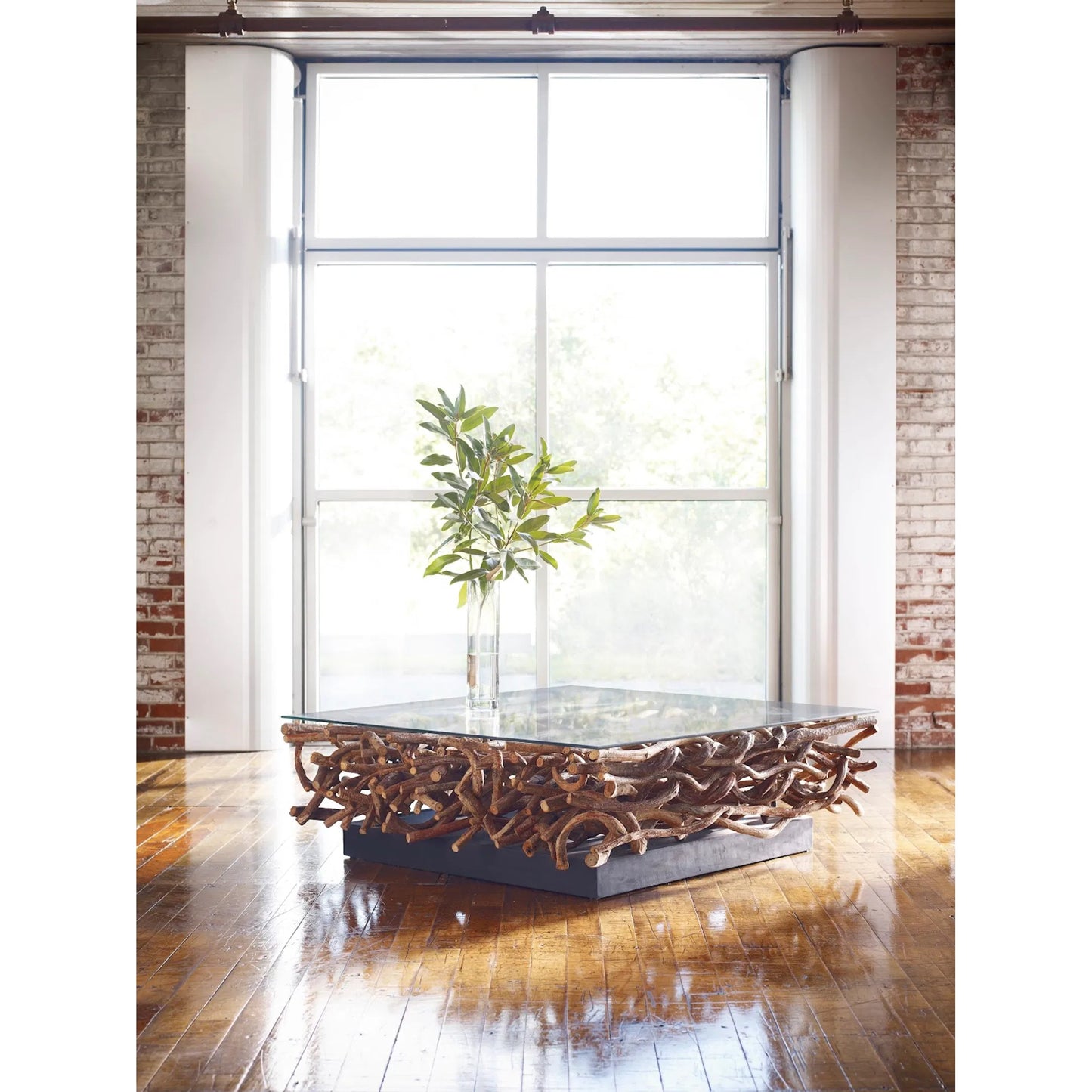 004 SR-821072 | Lifestyle | Vine Coffee Table by Phillips Collection in brown. Made from wood in a modern style.