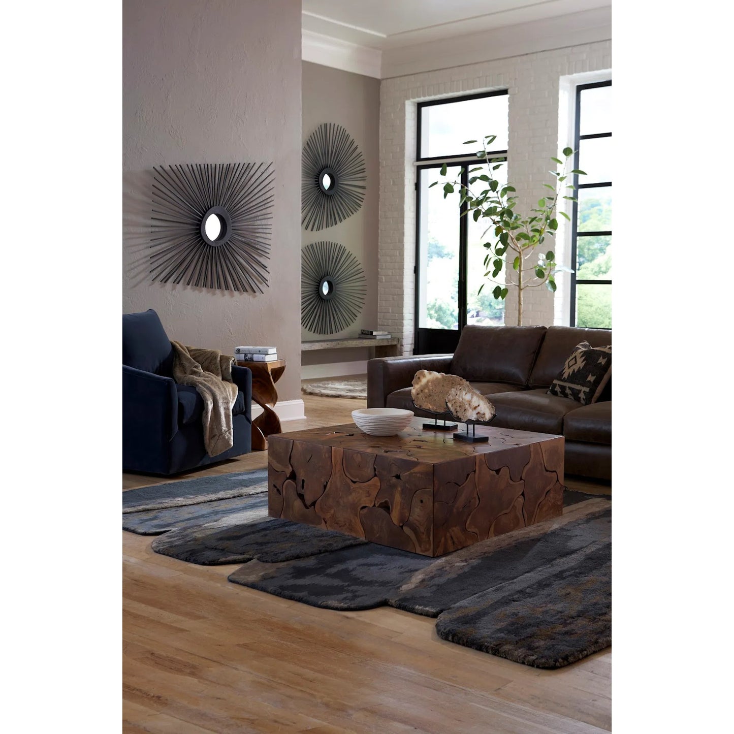 022 SR-820972 | Lifestyle | Spoke Round Mirror by Phillips Collection in charred. Made from wood in a modern style.