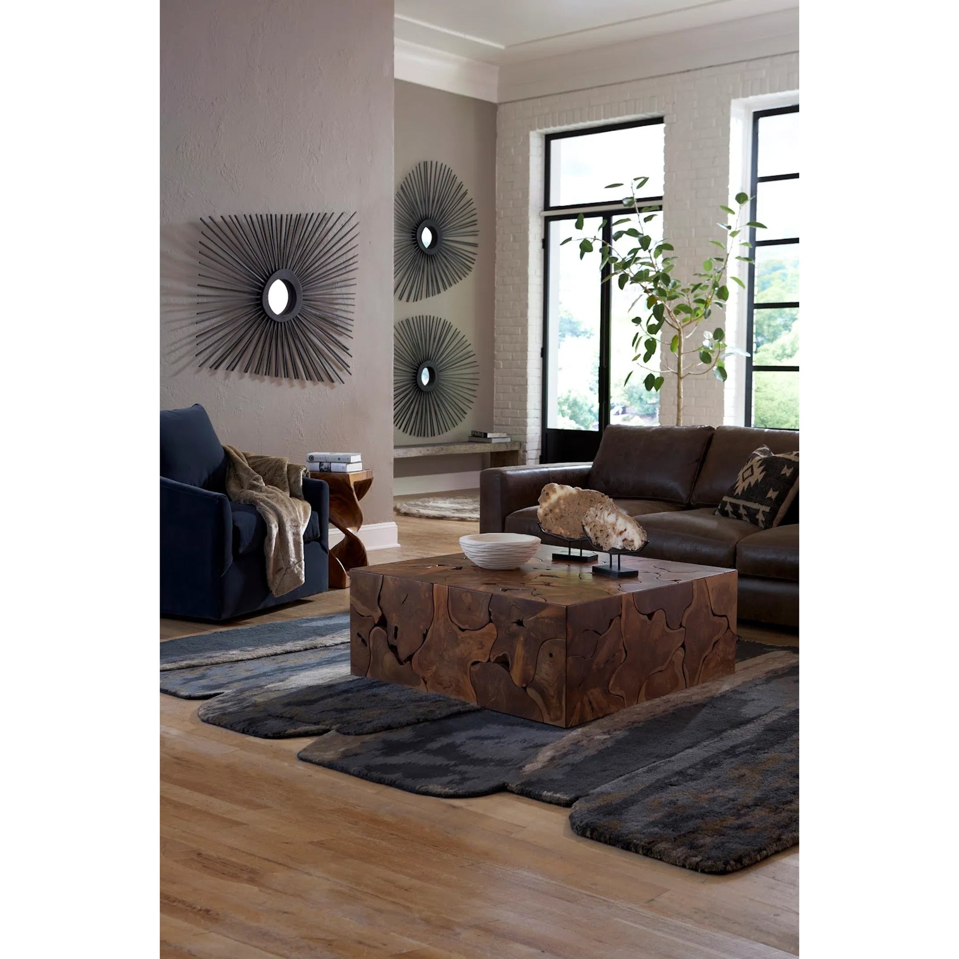 Spoke Round Mirror by Phillips Collection in charred. Made from wood in a modern style.
