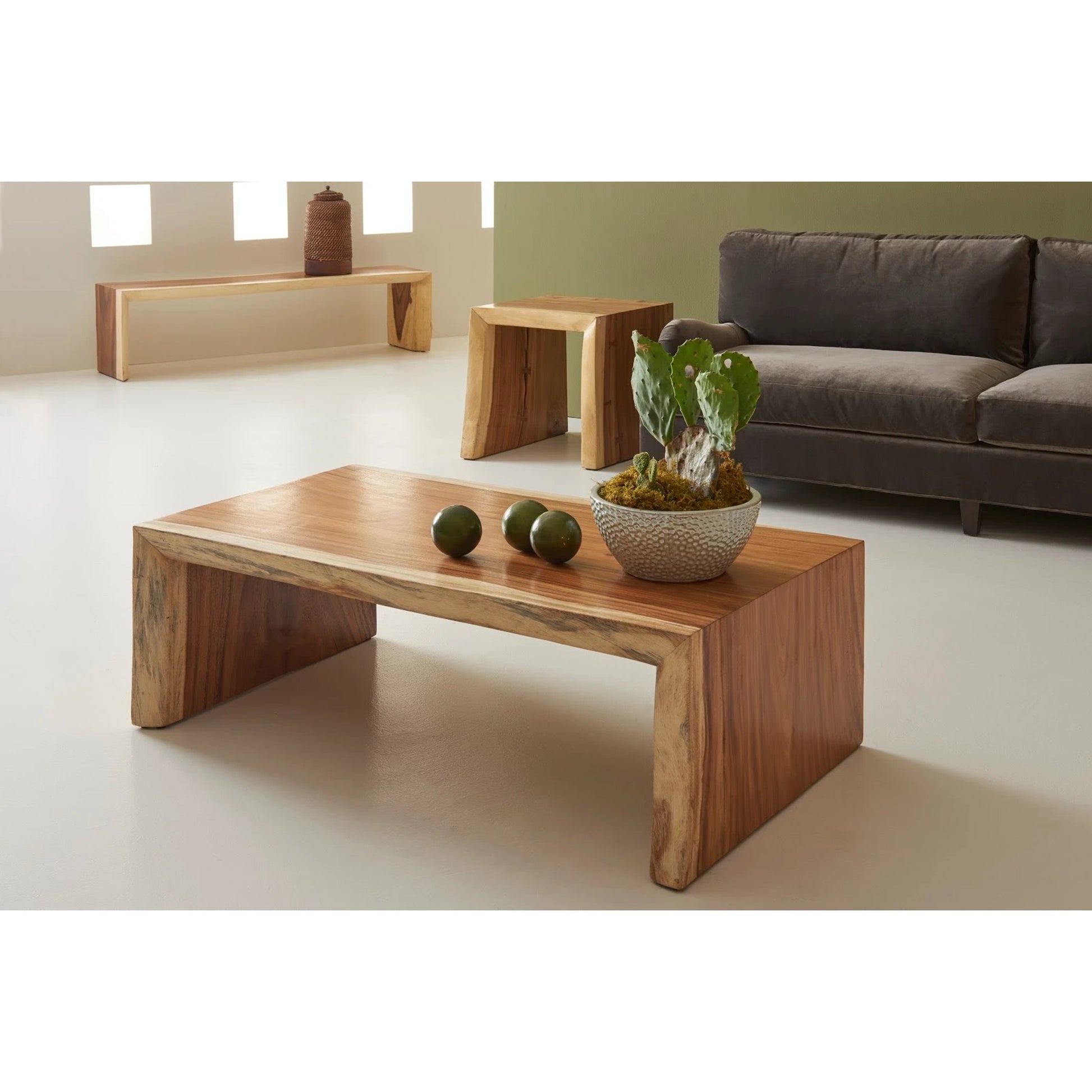 Waterfall Side Table by Phillips Collection in gray stone. Made from unique in a eclectic & global style.