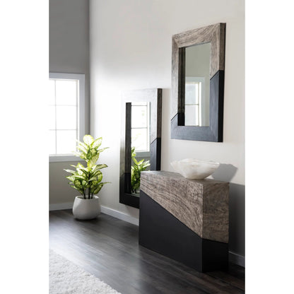 Geometry Console Table by Phillips Collection in gray stone. Made from wood in a rustic style.
