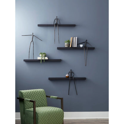 Long Moveable Sitting Man Shelf by Phillips Collection in black, gray. Made from metal, wood in a eclectic & global style.