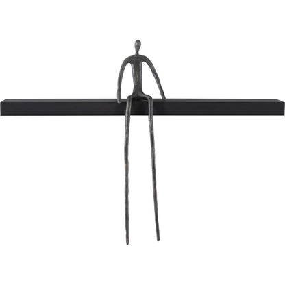 Long Moveable Sitting Man Shelf by Phillips Collection in black, gray. Made from metal, wood in a eclectic & global style.
