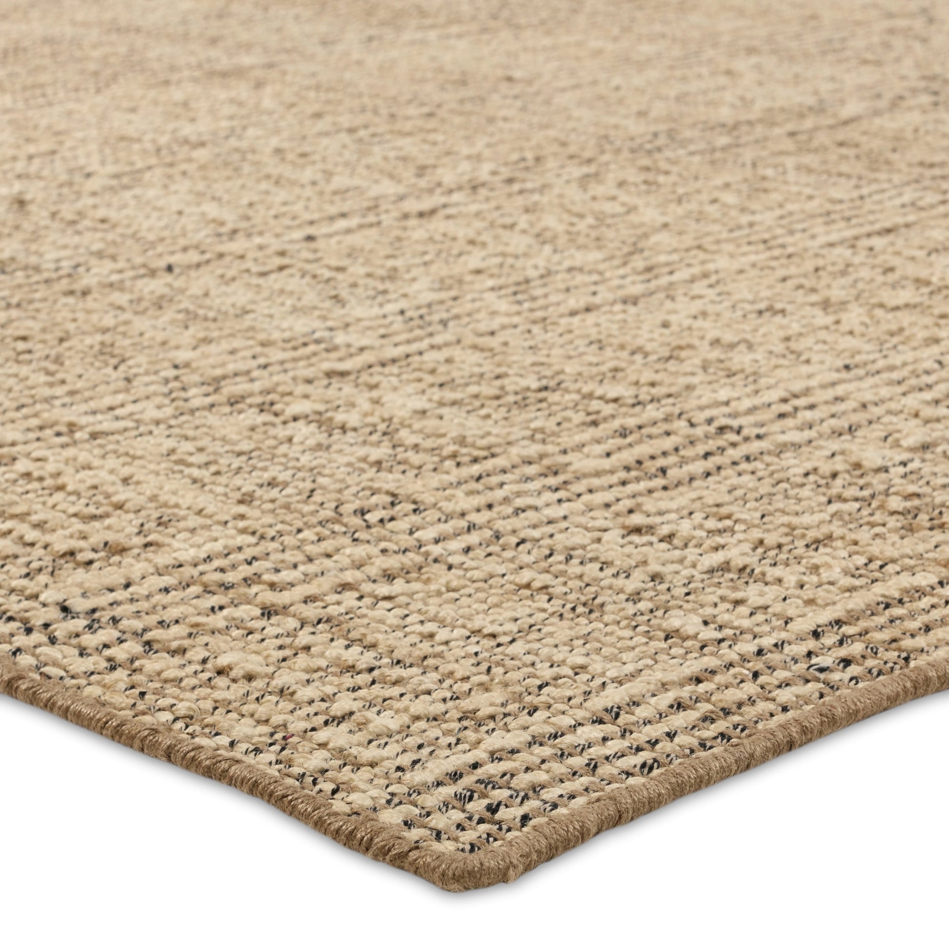 Thatcher Almaz Rug by Jaipur Living in tan. Made from 80% jute, 20% cotton in a unique style.