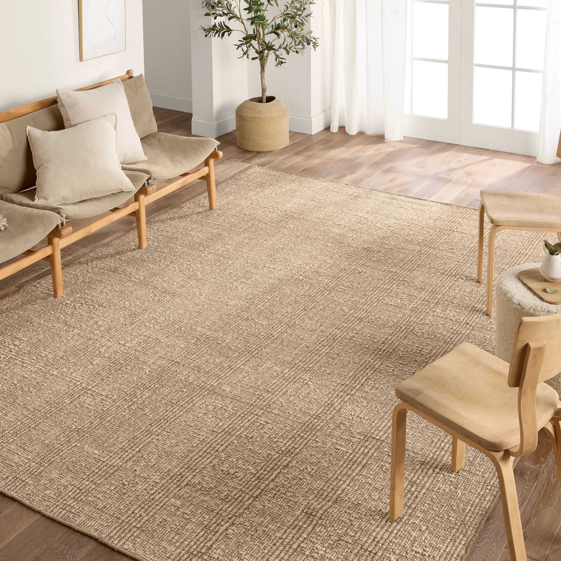 Thatcher Almaz Rug by Jaipur Living in tan. Made from 80% jute, 20% cotton in a unique style.