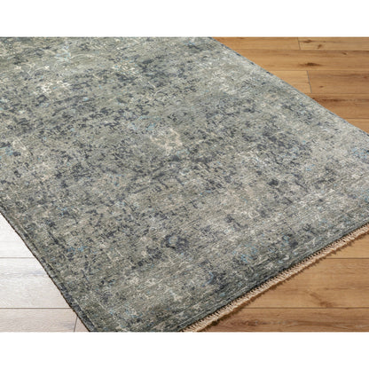 Theodora Rug - 30279 by Surya in charcoal, ice blue, gray, medium gray, light gray, black. Made from 100% viscose in a unique style.