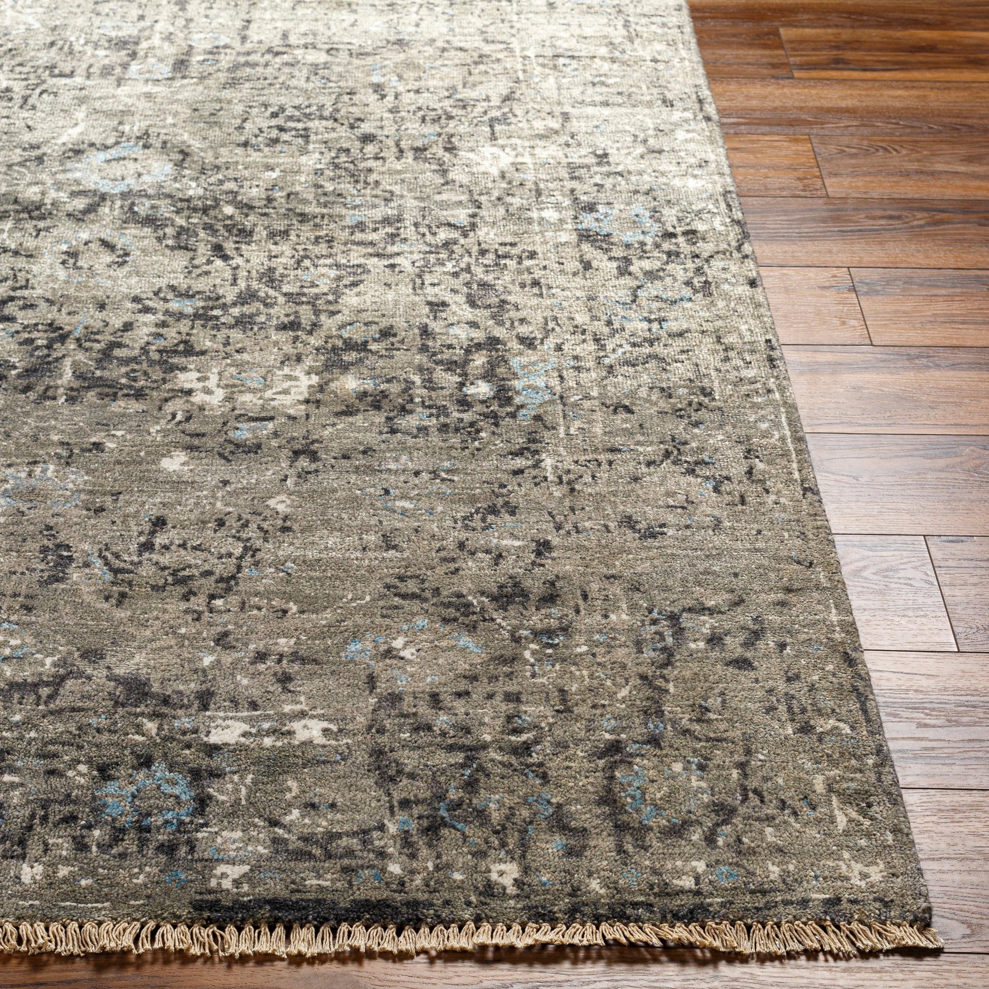 Theodora Rug - 30279 by Surya in charcoal, ice blue, gray, medium gray, light gray, black. Made from 100% viscose in a unique style.