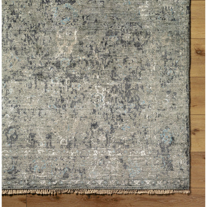 Theodora Rug - 30279 by Surya in charcoal, ice blue, gray, medium gray, light gray, black. Made from 100% viscose in a unique style.