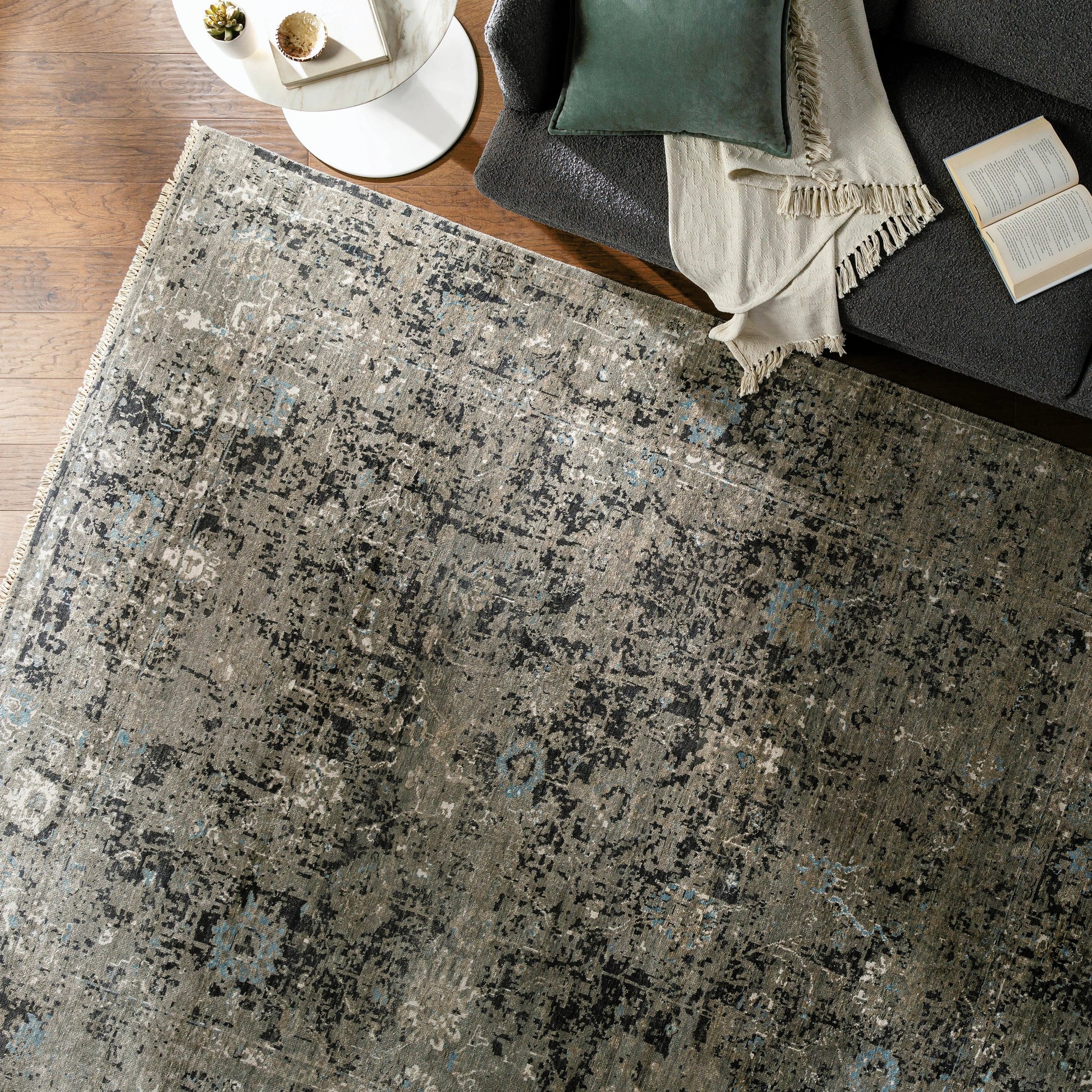 Theodora Rug - 30279 by Surya in charcoal, ice blue, gray, medium gray, light gray, black. Made from 100% viscose in a unique style.