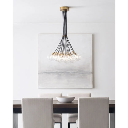 Gambit Multi-Port Chandelier by Tech Lighting in aged brass. Made from glass in a modern style.