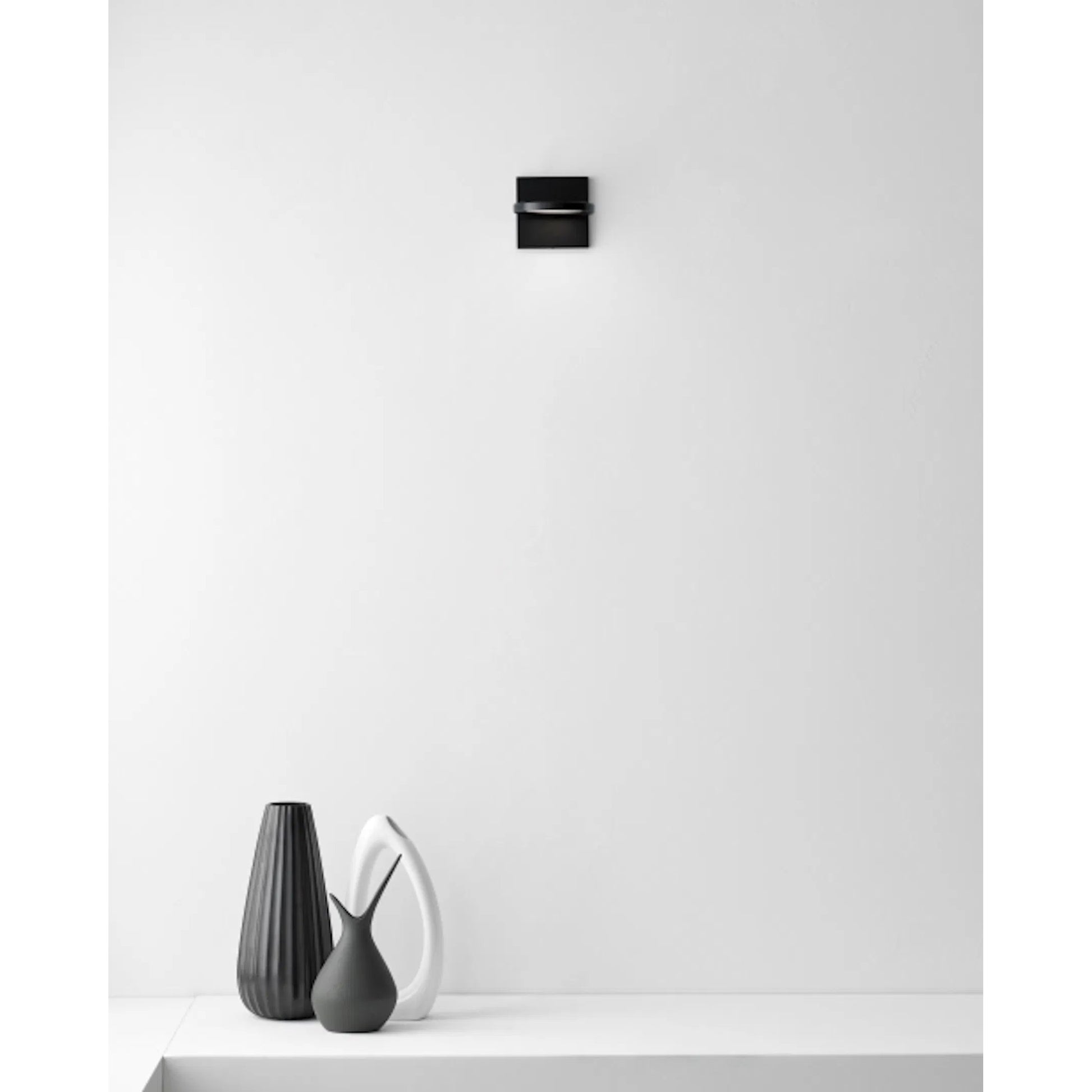 Spectica Wall Sconce by Tech Lighting in matte black. Made from aluminum in a modern style.