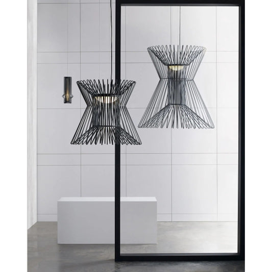 Syrma Grande Suspension by Tech Lighting. Made from metal in a modern style.