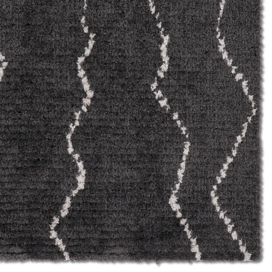 Tamry TMR04 Rug by Jaipur Living in black. Made from 100% polyester in a unique style.