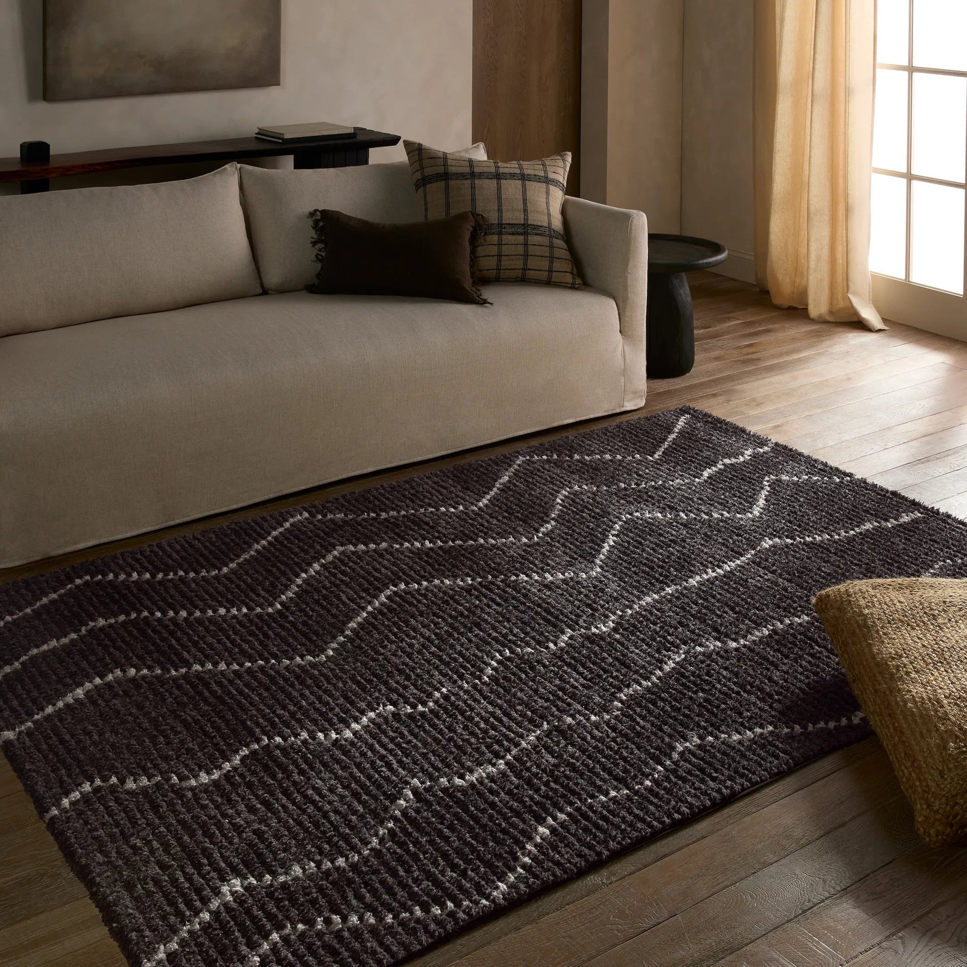 Tamry TMR04 Rug by Jaipur Living in black. Made from 100% polyester in a unique style.