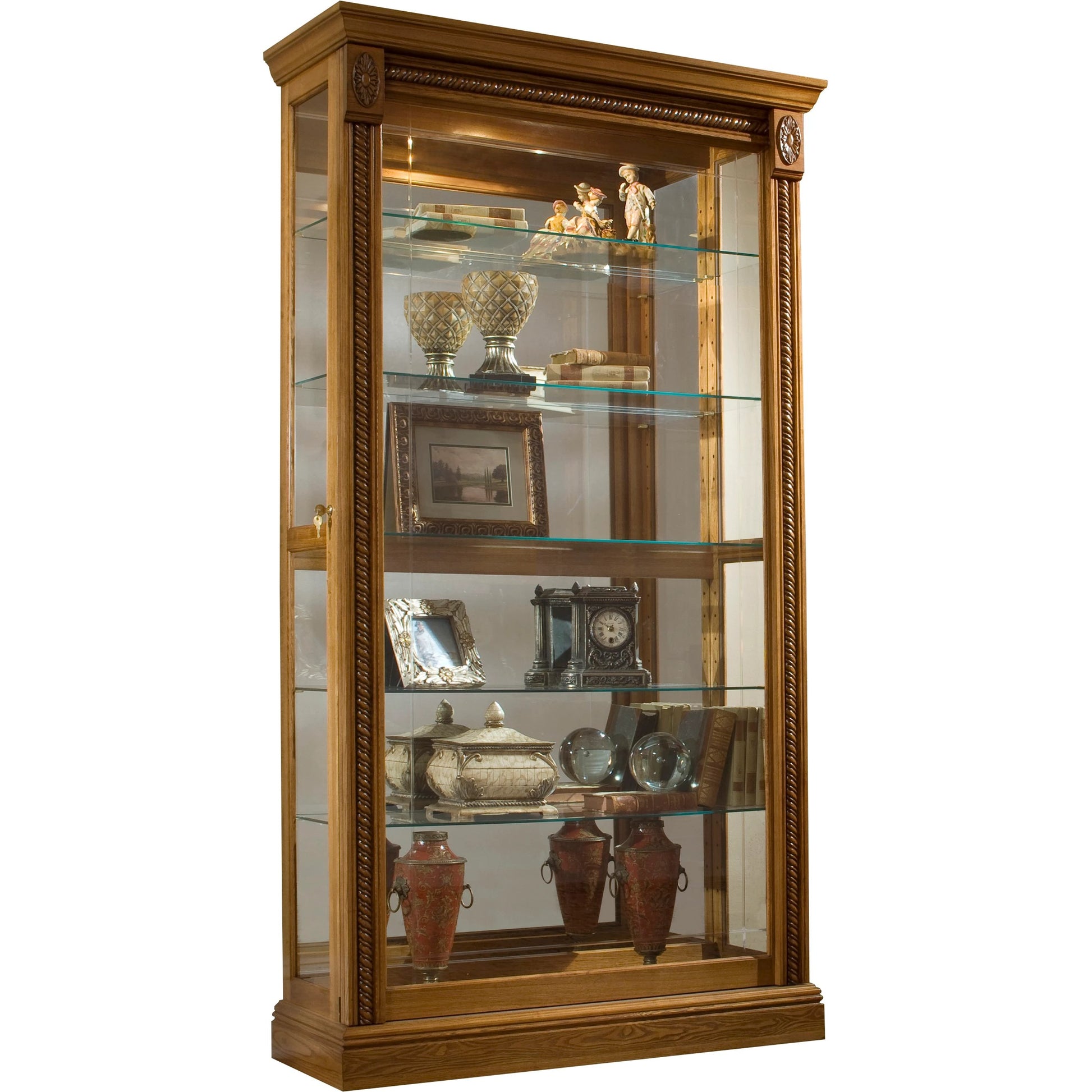43'' Wide Hardwood Two Way Sliding Door Curio Cabinet in Warm Honey by Pulaski Furniture in warm honey-tone. Made from hardwood solids in a traditional style.