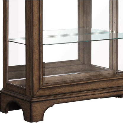 Traditional Sliding Door Curio with Glass Shelves and LED Light by Pulaski Furniture in chestnut. Made from oak wood veneers in a unique style.