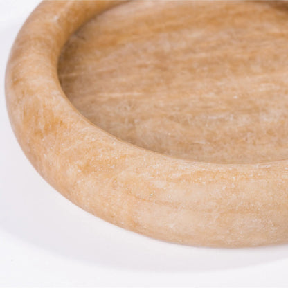 Round Edged Catch-All by TOV Furniture. Made from marble in a unique style.