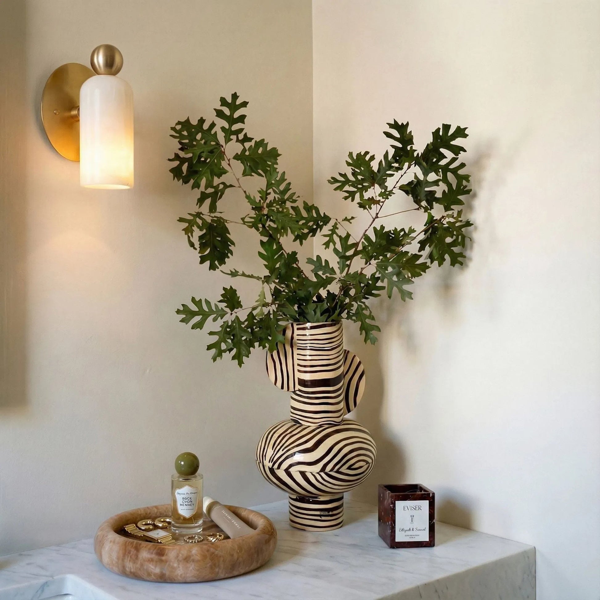 Round Edged Catch-All by TOV Furniture. Made from marble in a unique style.